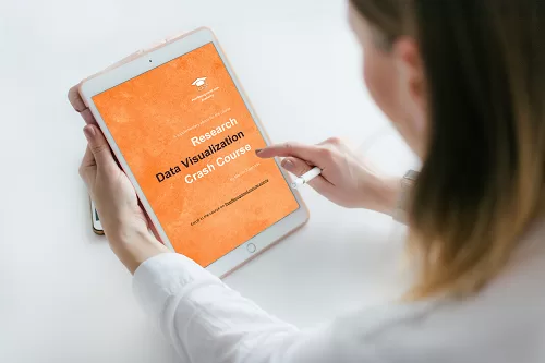 A course participant scrolling through the ebook "Research Data Visualization" on her iPad